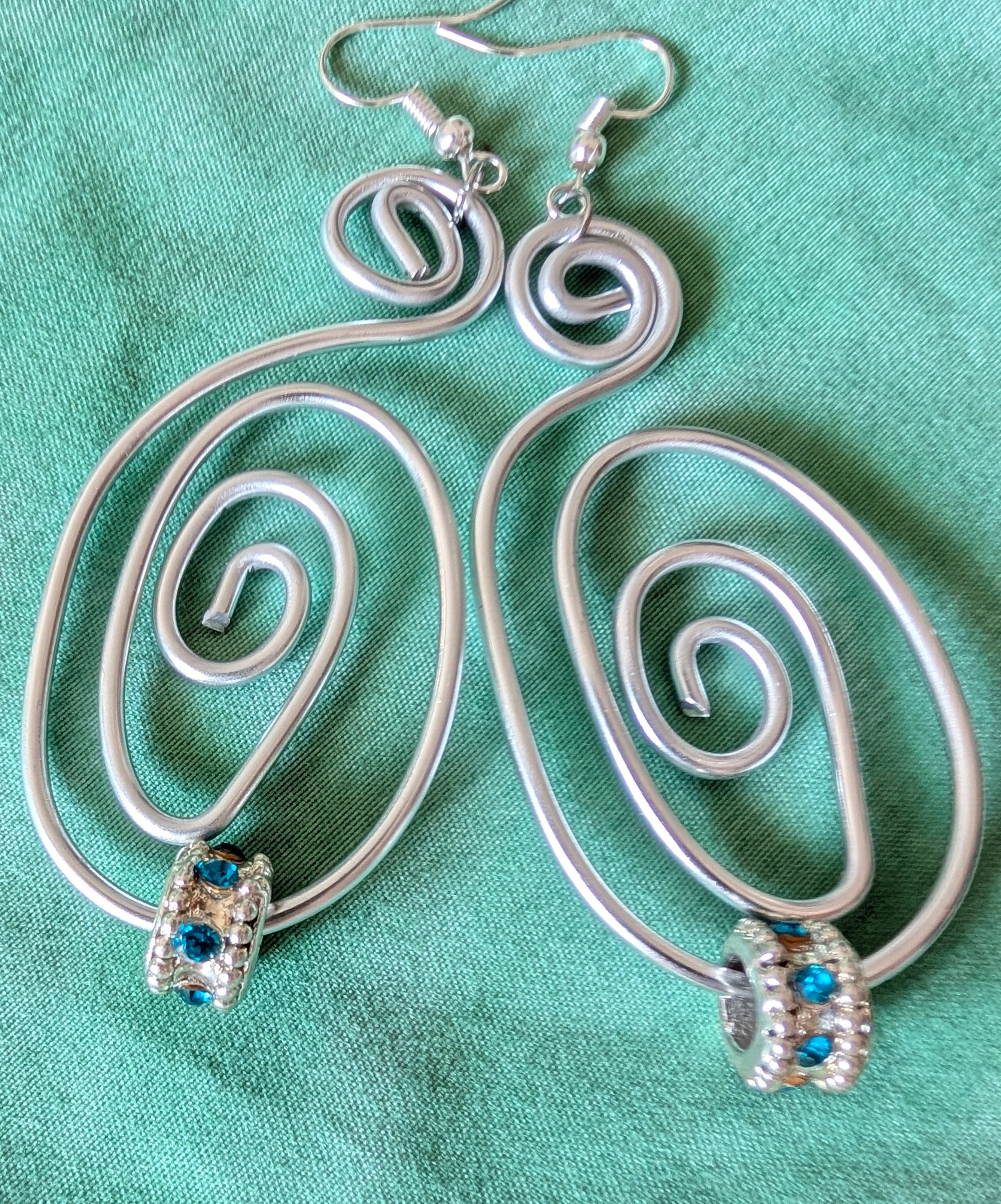 Silver Spiral Earrings with Blue Crystal | Statement Jewellery